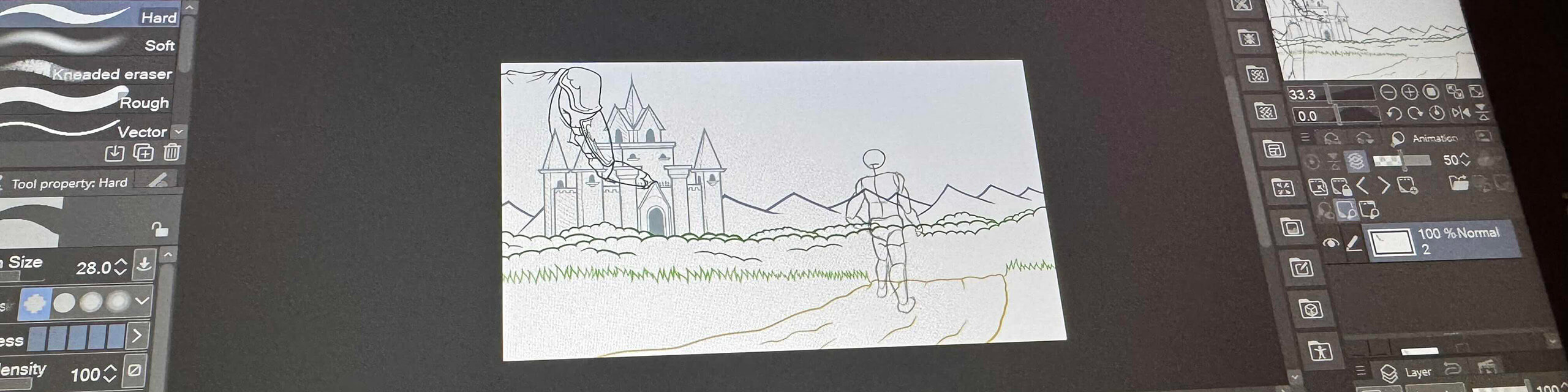 A laptop screen displays a Photoshop workspace with animation sketch of a castle and a dragon.