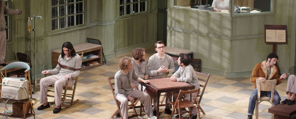 A scene depicting patients in the common room of a sanatorium.