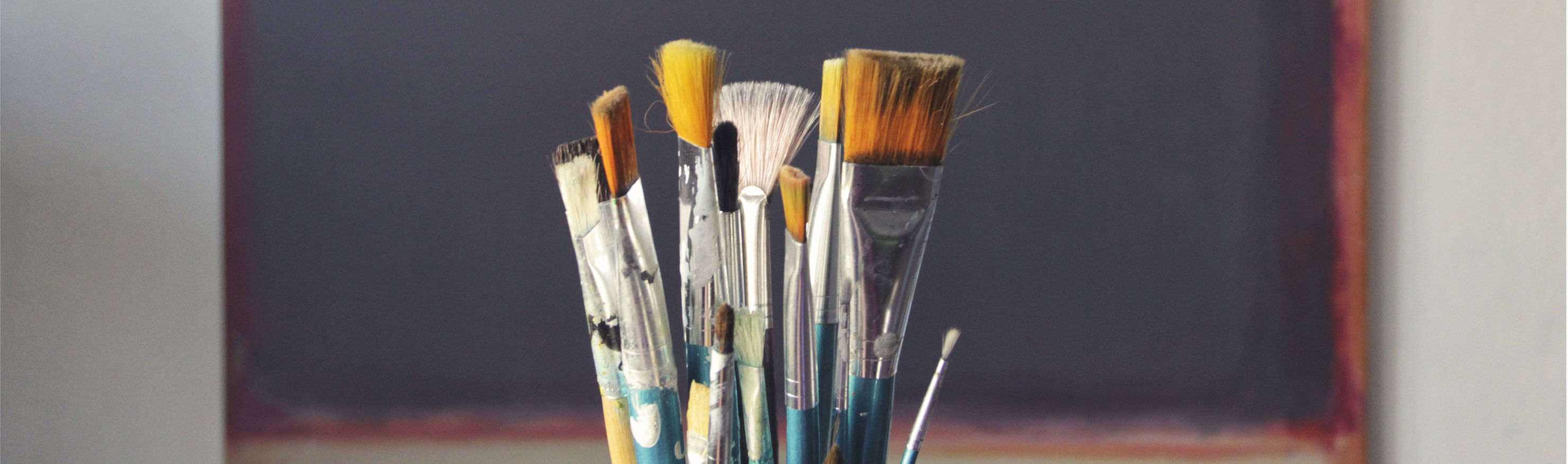 Brushes in front of a frame