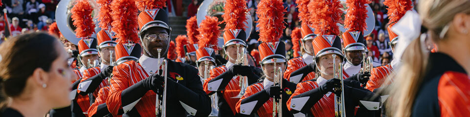 The Big Red Marching Machine performs on the field.