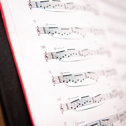 Sheet music on a stand.