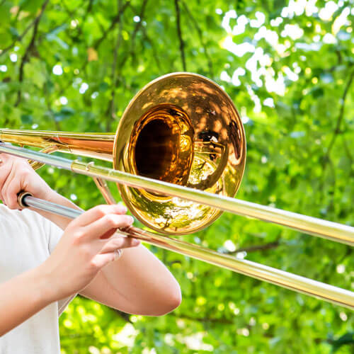Student plays her trombone.