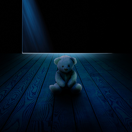 Illustration of a stuffed teddy bear on the floor of a dark room